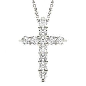 One 1.10CTW Round Moissanite Cross Pendant In 14K